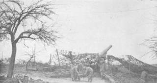 An 8 inch Howitzer pointed toward Germany.