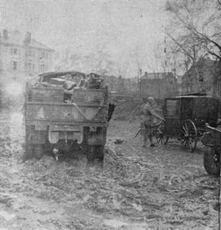 90th Division man at the estate belonging to Fritz von Papen examines an old buggy which probably carried the old Nazi statesman on many a jaunt.