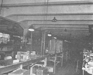 Interior of arms plant with huge store of small arms.