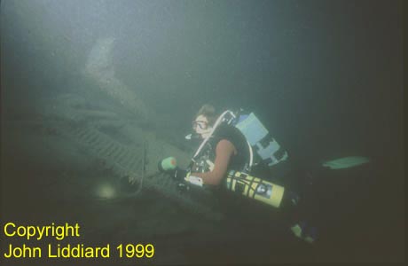 Diver and engine room debris. Link to copyright statement. 99284_07_small.jpg